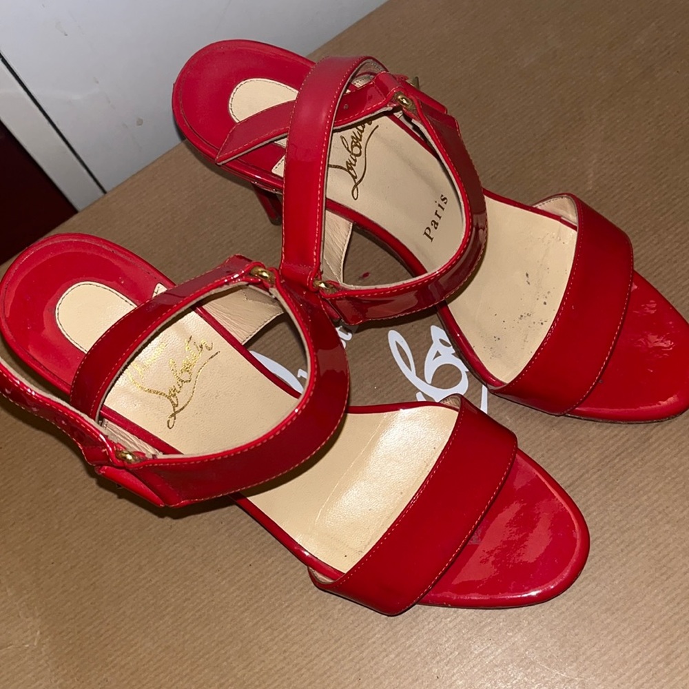 Christian Louboutin red sandals. 75 mm heels and in size 37